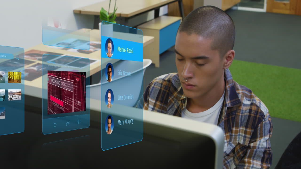 Animation of data processing on screen over biracial businessman in office