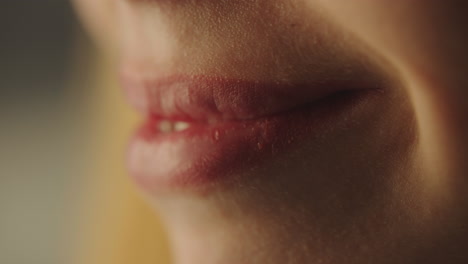 woman smiling with close-up on lips