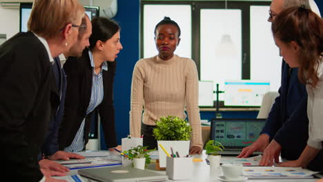 multiethnic team of professionals coworkers, brainstorming in a business meeting