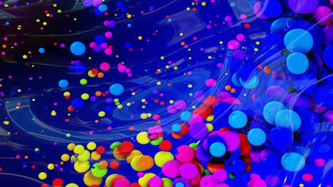 abstract looped background of shiny glossy surface like wavy blue liquid with rainbow color circles float like drops of paint in oil. beautiful creative background with color gradient in 4k. 3d