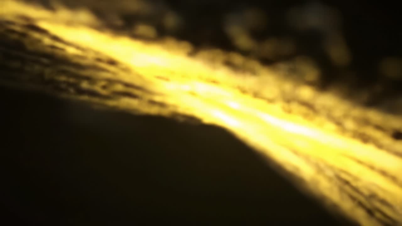 Golden light spills across the rugged terrain at sunset, enhancing the contours and textures of the landscape. The calming aura reflects the beauty of nature as twilight approaches.