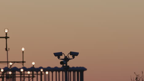 airplane landing at sunset