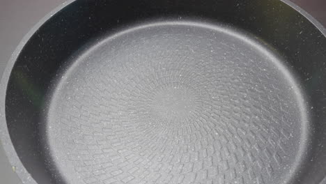 empty gray non-stick frying pan