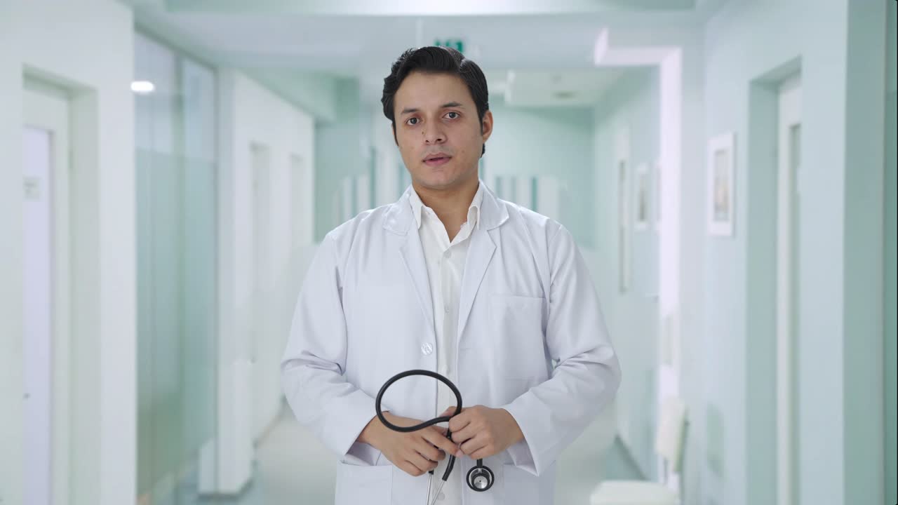 Sad Indian doctor delivering bad news