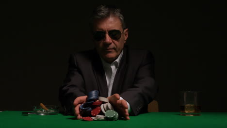 confident gambler going all in