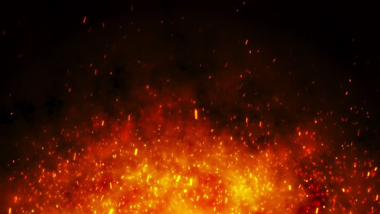 Partículas de brasas de fuego sobre fondo negro
