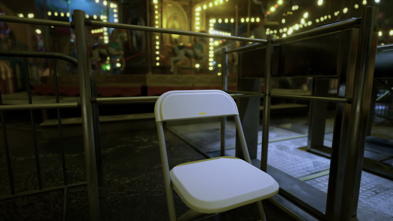 Empty chair near festive lights at evening carnival attraction