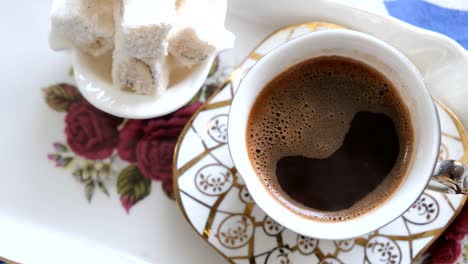 turkish delight and coffee served on the table