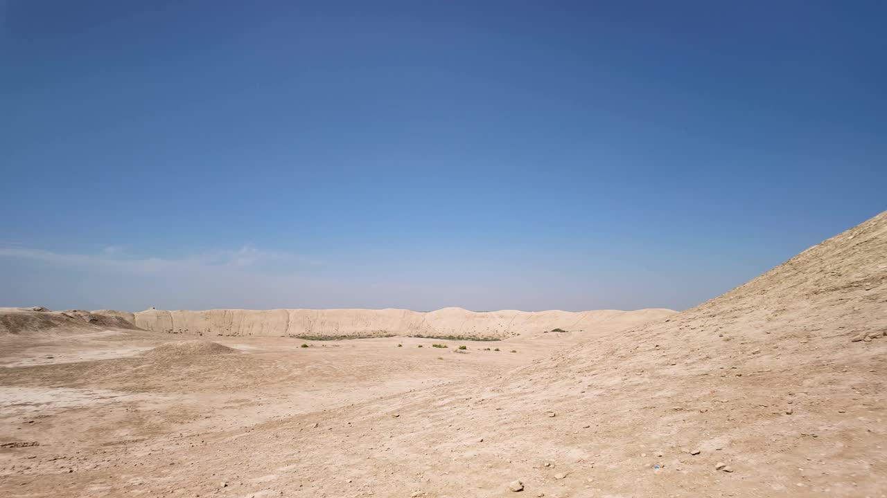 Dirt mounds cover the historic city of Erk Kala, in the desert of Ancient Merv, Turkmenistan