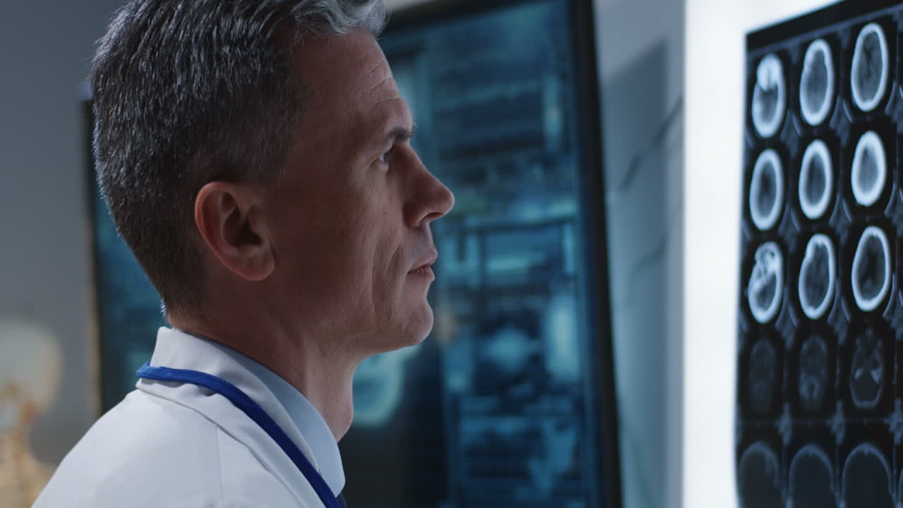 Doctor reviewing medical scans