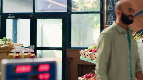 man examining organic pantry supplies