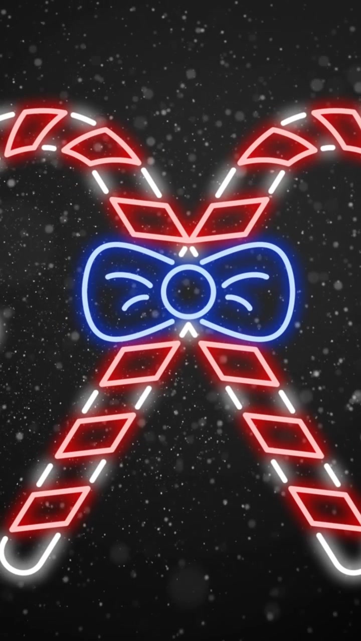Animation of snow falling over christmas candy canes