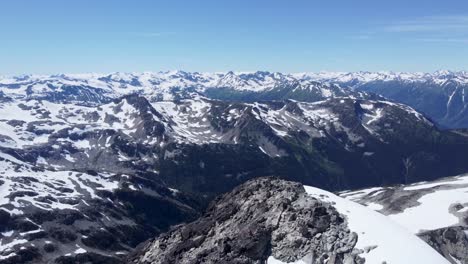 cinematic snow mountain landscape with ridges and valleys - drone footage