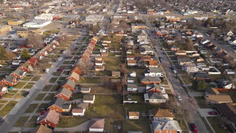aerial view of a suburban residential neighborhood with houses and streets