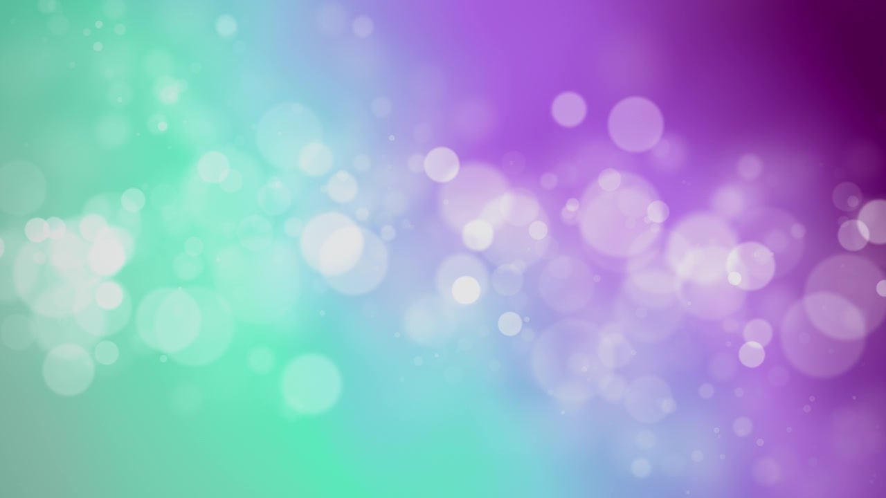 Abstract background with glowing teal and purple bokeh lights, creating a soft and dreamy atmosphere.