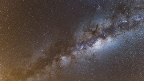 time-lapse of the rising milky way galaxy with tracking taken over the namibian savanna.