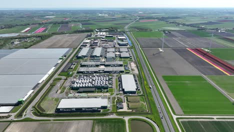 large scale data center, bits and bytes, server space, cloud services, building exterior. aerial view.