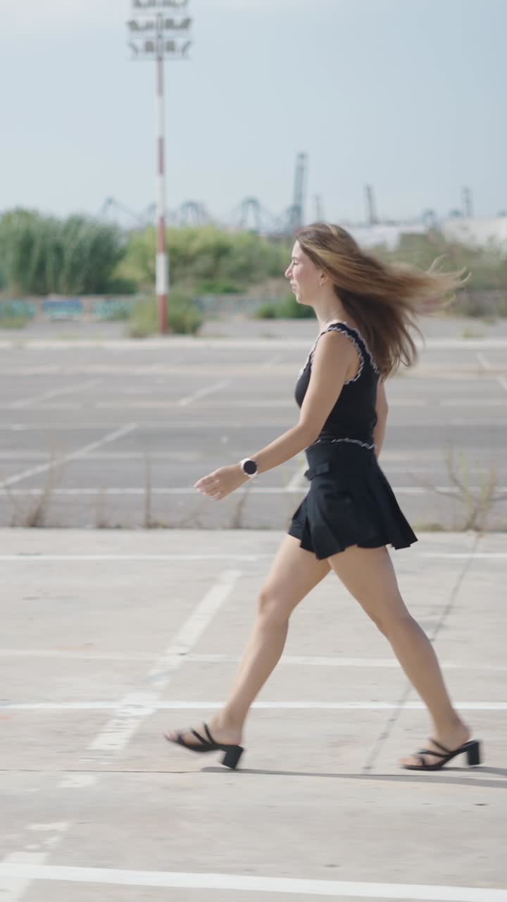 Woman Walking in Parking Lot