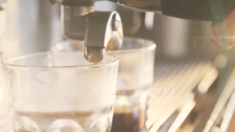 animation of light spots over hands of caucasian man preparing coffee