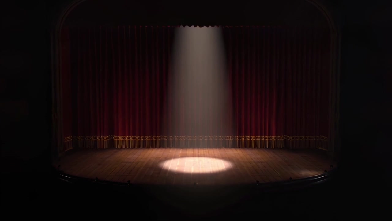 Riflettore che Illumina un Palco Teatrale Vuoto
