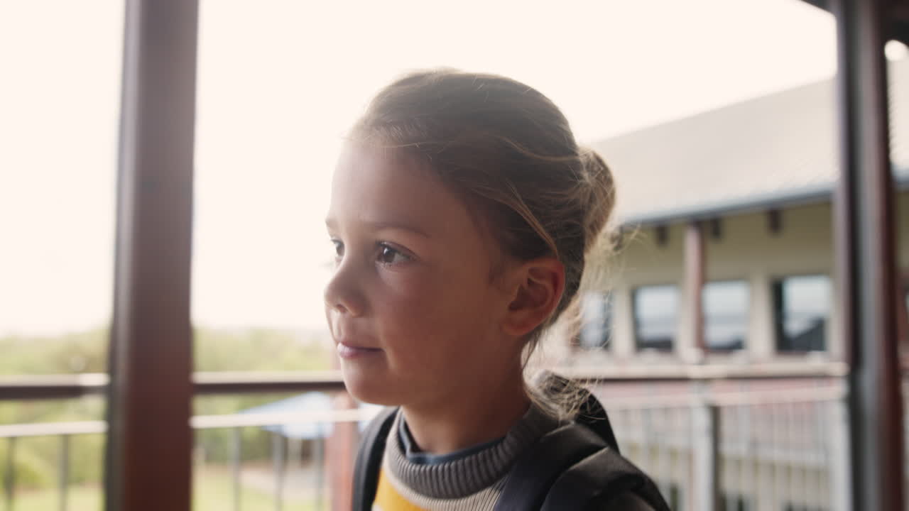 Girl with backpack at school