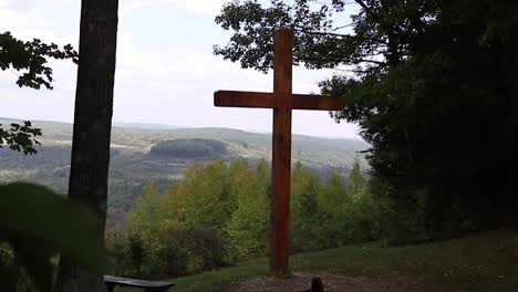 large wooden cross overlooking a valley in the appalachian mountains