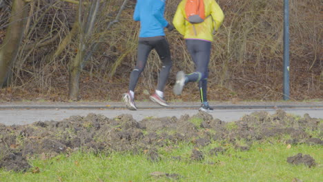 young man practicing morning jog workout on sports path