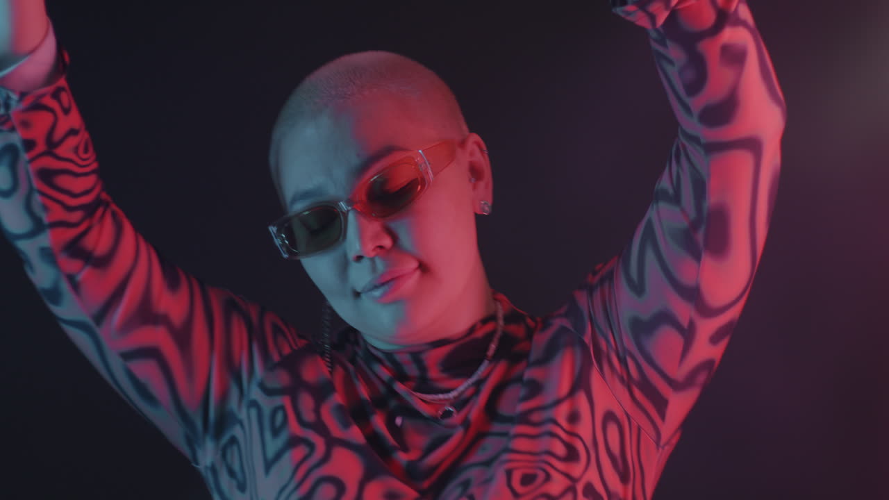 Stylish Woman in Neon Lighting