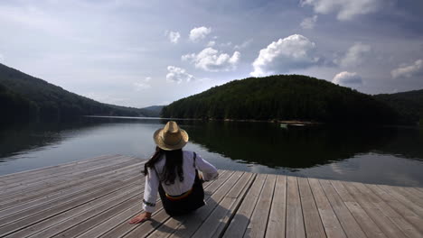 romanian girl on the lake pontoon - valiug, romania 4