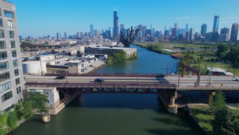 cars driving over chicago 18th street bride blue sky downtown