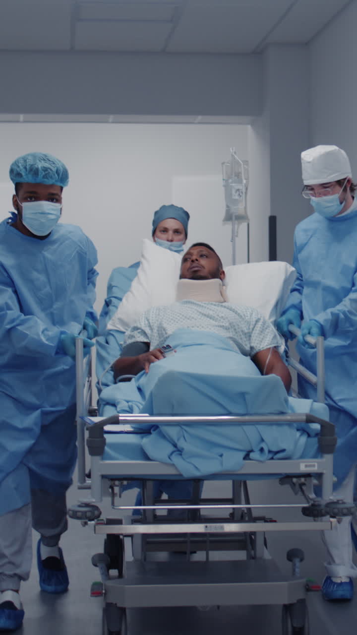 Doctors and paramedics push stretcher in clinic 4k 2025 07 24 07 02 45 utc.mov | african american, assistance, care, caucasian