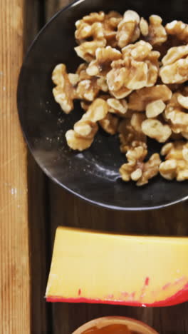 jam, rosemary herb, walnuts, cheese, sauce, crispy biscuits and grater