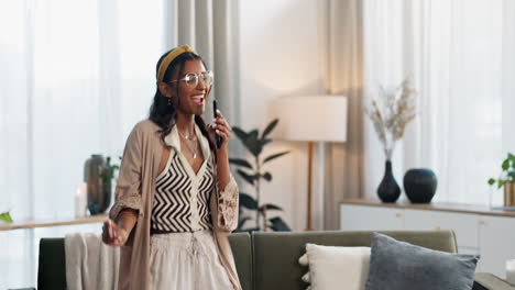 Home,-dancing-and-woman-with-a-smartphone