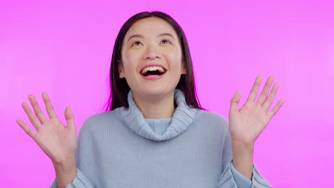 Hands,-wow-and-happy-woman-in-studio-looking-up