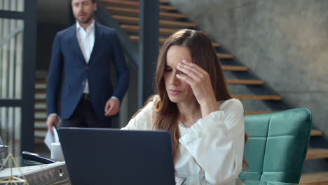 Angry-boss-throwing-papers-in-front-of-secretary.-Upset-woman-feeling-stress