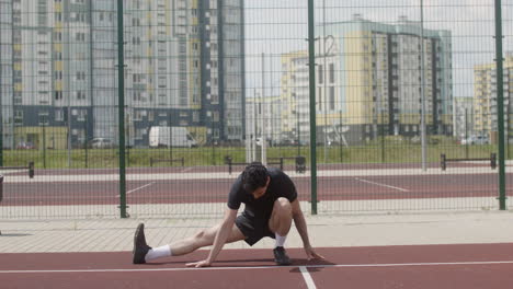 brunet man stretching