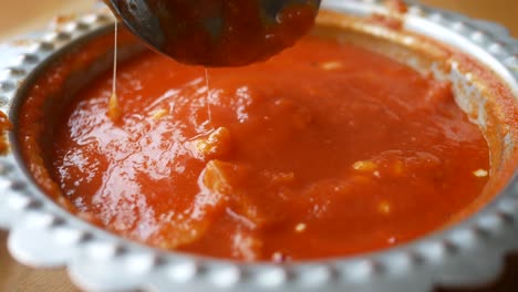 close up of a red sauce