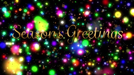 animation of seasons greetings text banner over glowing colorful spots of light on black background