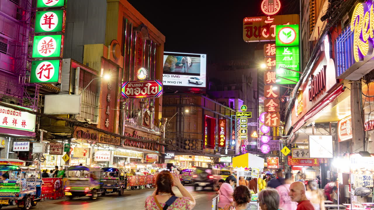 timelapse of china town and night time traffic in bangkok