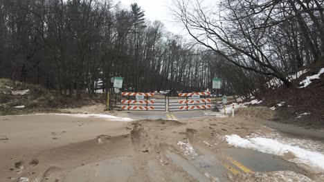 pulling back from the closed road signage in muskegon