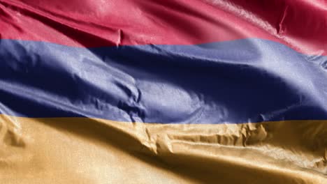 bandera textil de armenia agitando lentamente en el bucle del viento. bandera armenia balanceándose suavemente en la brisa. tejido textil de tela. fondo de relleno completo. bucle de 20 segundos.