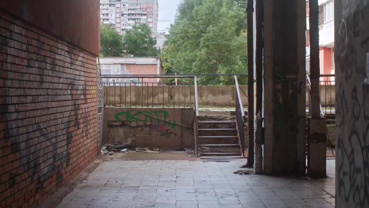 A neighborhood with brutalist, communist architecture apartment buildings and the surrounding neighborhood environment from the communist era in Eastern Europe