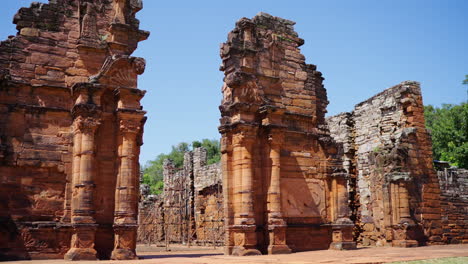 camera establishing rises at san ignacio archaeological ruins, argentine travel landmark destination