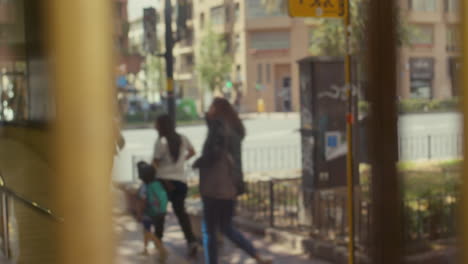 Reflection-of-people-in-the-glass-door