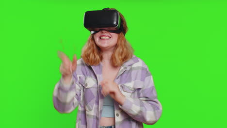 Excited-woman-in-VR-headset-helmet-watching-virtual-reality-3D-video,-playing-simulation-online-game