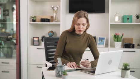 the subordinate approaches the director and brings papers and documents. the boss reviews them and rejects with dissatisfaction. the woman is busy with paperwork in the office