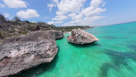 Rocks-And-Sea-Stacks-At-Bahia-de-las-Aguilas-With-Turquoise-Blue-Water-In-Dominican-Republic