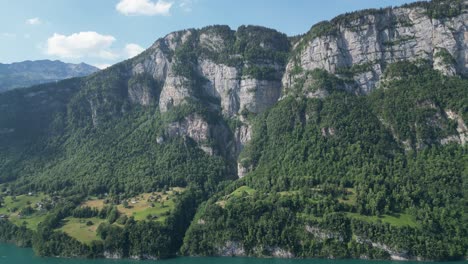 Fantasy-like-cinematic-aerial-view-of-rocky-mountains-with-green-foliage