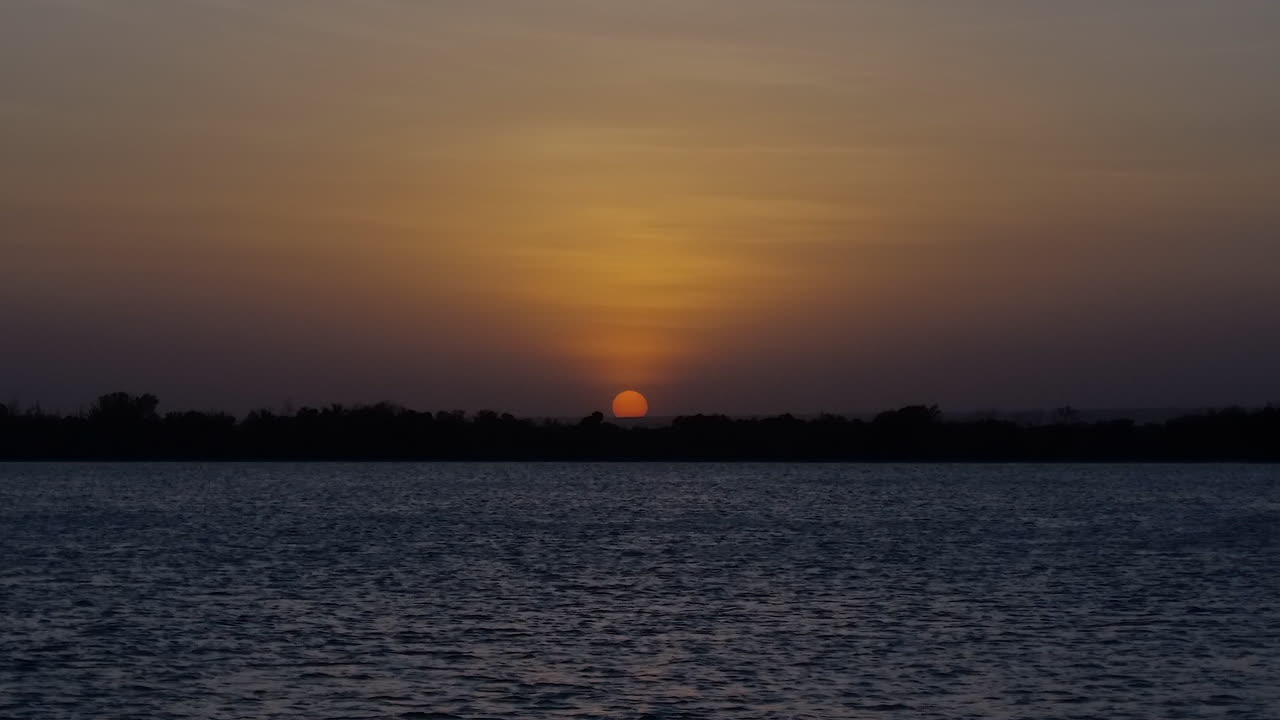 Sunset over a calm lake