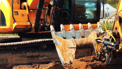 heavy caterpillar excavator working in quarry. big powerful construction machine